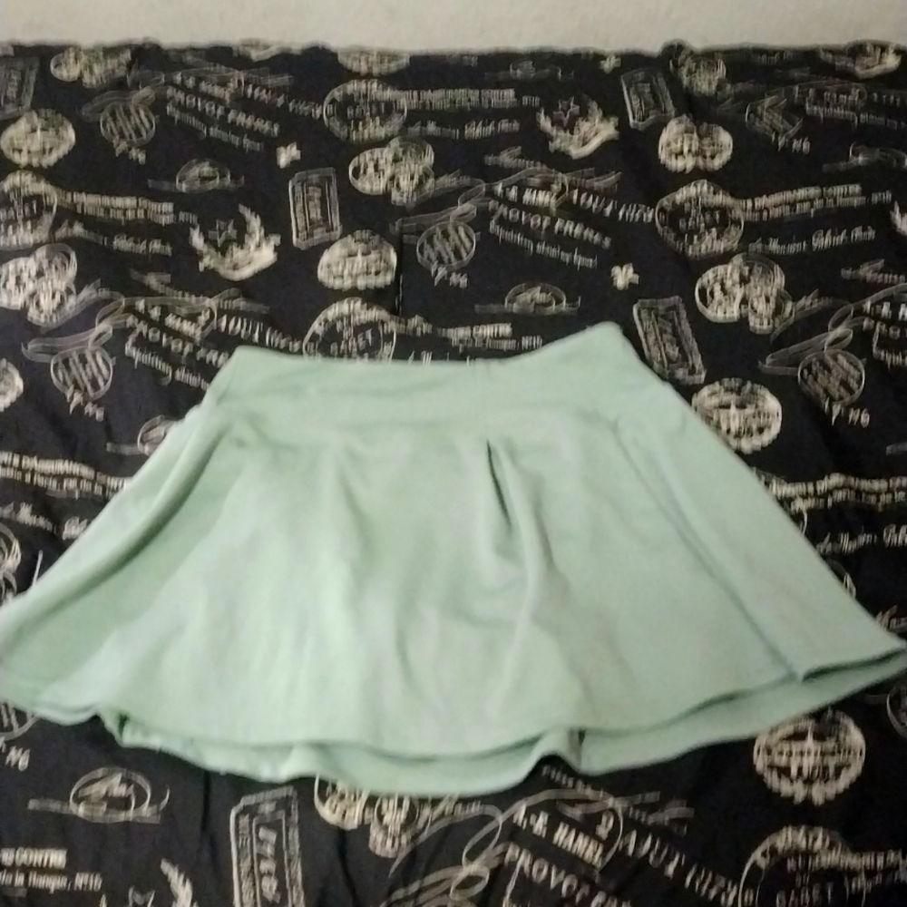 A sage green skirt